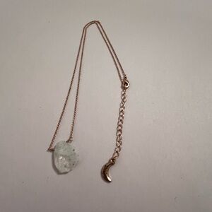 Gold Toned Necklace with Clear Raw Quartz Pendant